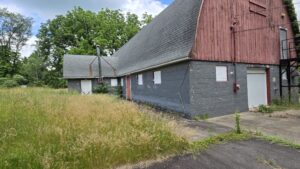 Lord Stirling School Redevelopment - Red & Gray Condemned Barn Structure